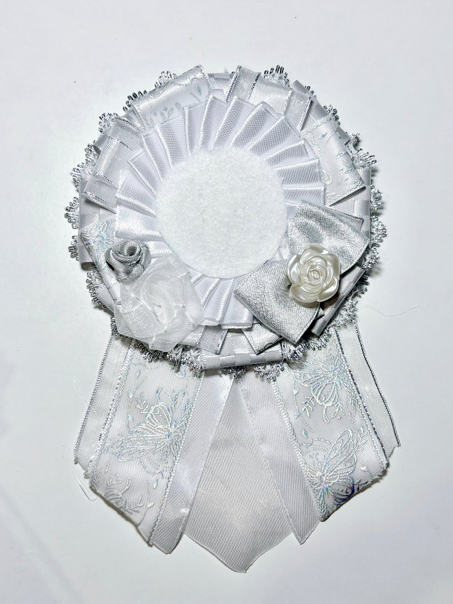 white and silver rosettte